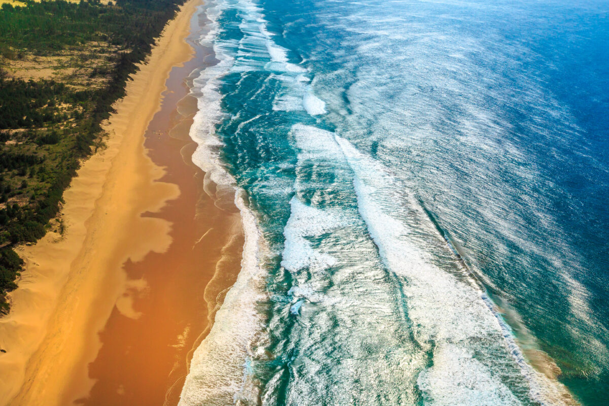 Aerial view of east coast of South Africa in Sodwana Bay National Park within the iSimangaliso Wetland Park, Maputaland, KwaZulu-Natal area. Indian ocean background.